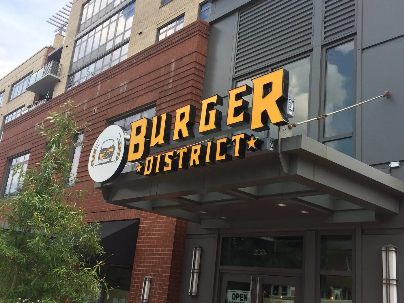 Illuminated channel-letter sign — Burger District