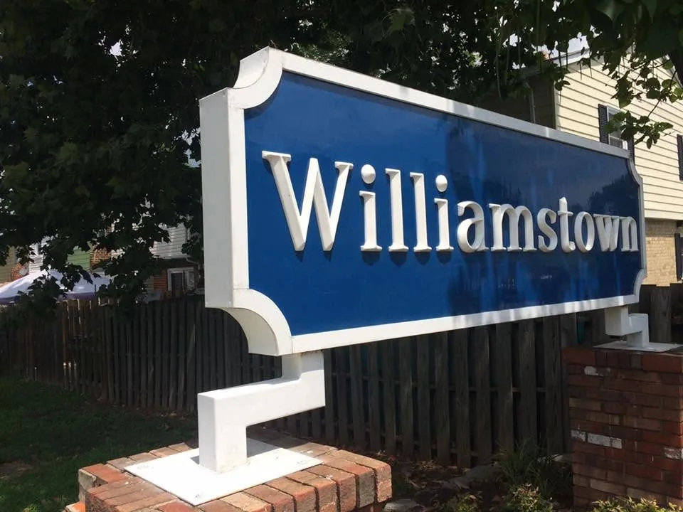Bucket-truck sign installation — Williamstown